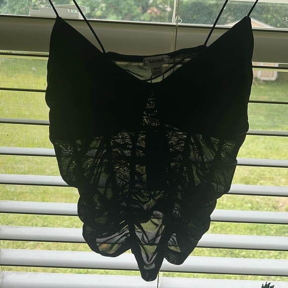 Garage tank top that is mesh and see through, shown in last pic. - Picture 4 of 4
